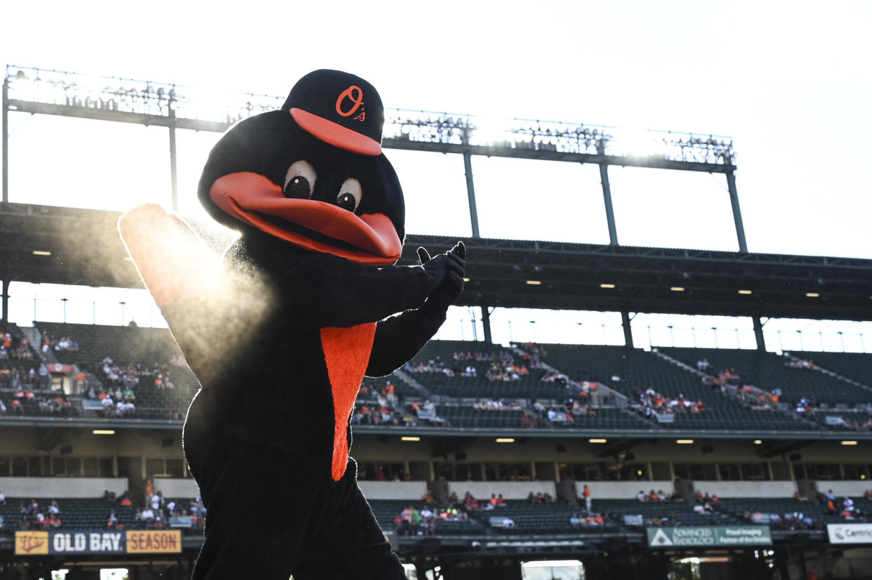 Baltimore Orioles mascot Bird walks on the field before Monday's game at Camden Yards. (Tommy Gilligan/Reuters)