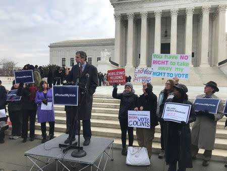 U.S. Senator Sherrod Brown (D-OH) addresses a rally ahead of arguments in a key voting rights case involving a challenge to the OhioÕs policy of purging infrequent voters from voter registration rolls outside the U.S. Supreme Court in Washington, U.S., January 10, 2018. REUTERS/Lawrence Hurley