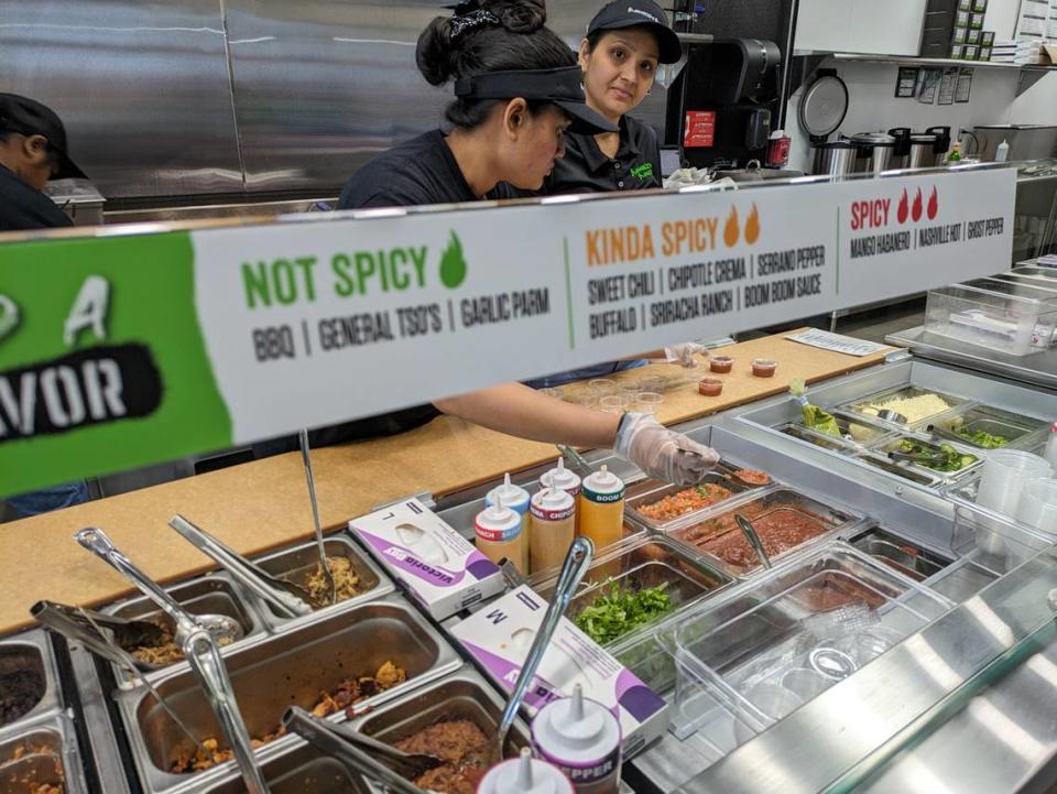 A peek at the fillings and toppings counter at Bubbakoo’s Burritos in Glen Carbon