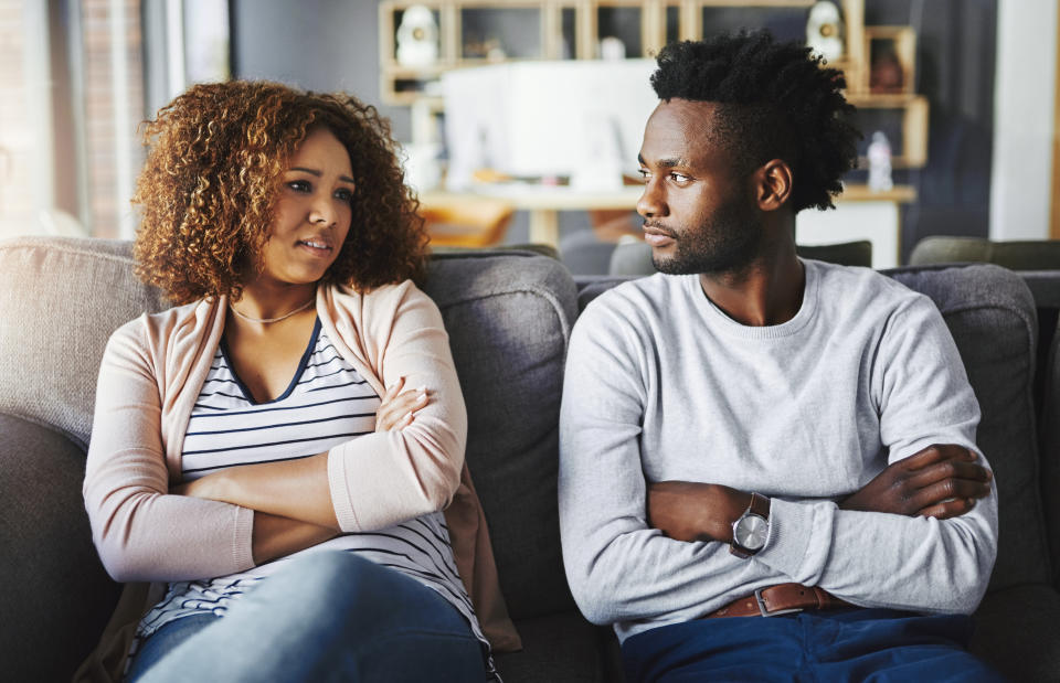 Shot of a young couple having relationship problems at home