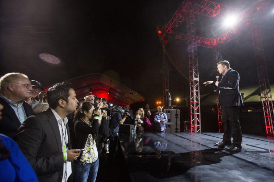 Elon Musk, CEO of Tesla Motors Inc., announces its new Tesla "D", a new all-wheel-drive version of the Tesla Model S car in Hawthorne, Calif., Thursday, Oct. 9, 2014.