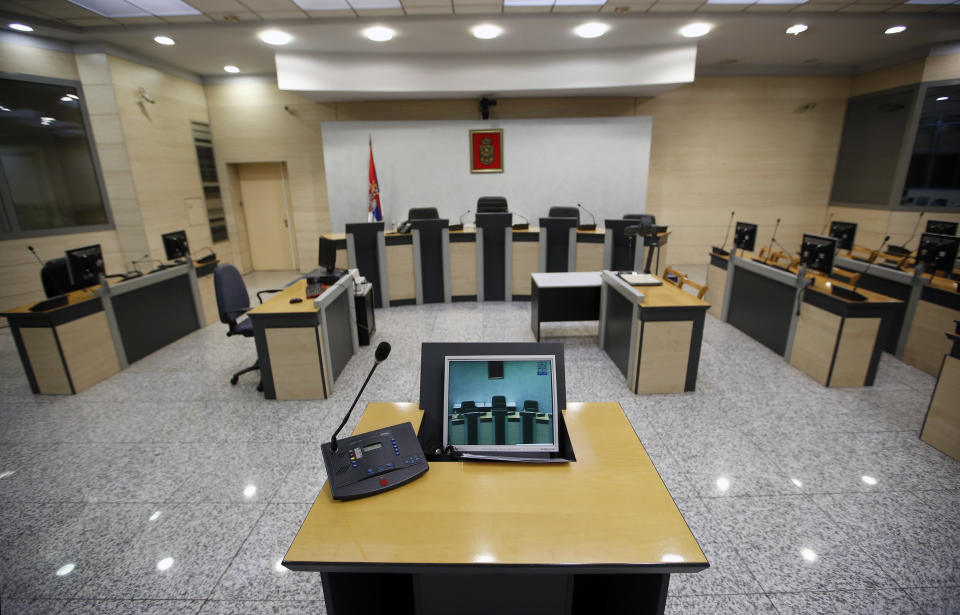 A view of the empty room of The Organized Crime court prior to the sentence of Darko Saric leader of a criminal organization, in Belgrade, Serbia, Monday, Dec. 10, 2018. A Serbian court has sentenced a Balkan drug lord to 15 years in prison for smuggling 5.7 tons of cocaine from South America to Europe. (AP Photo/Darko Vojinovic)