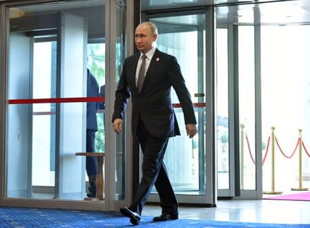 Russia’s President Putin arrives to a session of the SCO summit in Bishkek