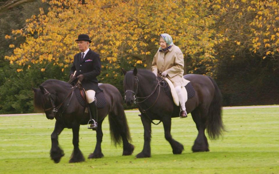 The late Queen riding Emma at Windsor with Terry Pendry - TV/Shutterstock