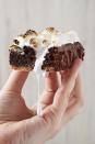 <p>Just when we thought we had seen every type of <a href="https://www.delish.com/cooking/recipe-ideas/g2782/smores/" rel="nofollow noopener" target="_blank" data-ylk="slk:s'more;elm:context_link;itc:0;sec:content-canvas" class="link ">s'more</a> possible, this one blew us away. <a href="https://www.delish.com/cooking/recipe-ideas/recipes/a51007/homemade-brownie-recipe/" rel="nofollow noopener" target="_blank" data-ylk="slk:Brownies;elm:context_link;itc:0;sec:content-canvas" class="link ">Brownies</a> get poked AND topped with marshmallows and then drizzled with chocolate. A graham cracker crust isn't totally necessary, but it's really fun and makes for a more epic s'mores-themed brownie.</p><p>Get the <strong><a href="https://www.delish.com/cooking/recipe-ideas/recipes/a53051/smores-poke-brownies-recipe/" rel="nofollow noopener" target="_blank" data-ylk="slk:S'mores Poke Brownies recipe;elm:context_link;itc:0;sec:content-canvas" class="link ">S'mores Poke Brownies recipe</a></strong>.</p>