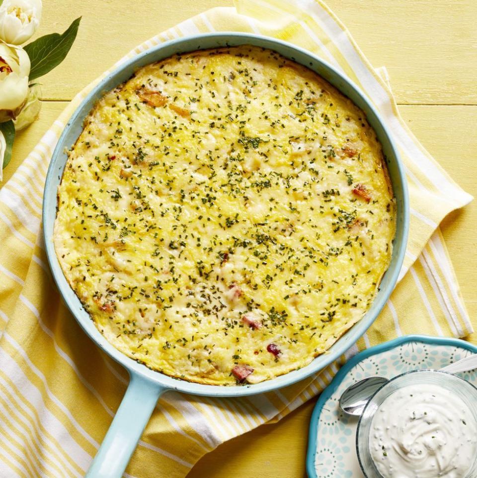 easter brunch ideas ham and cheese frittata with caramelized onions yellow background