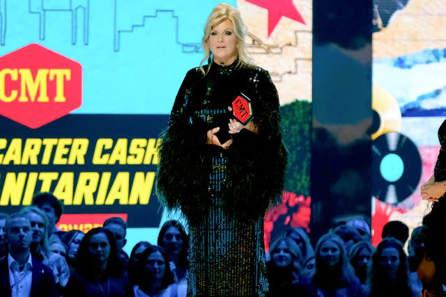 <p>Hubert Vestil/Getty</p> Trisha Yearwood accepts the June Carter Cash Humanitarian Award at the 2024 CMT Awards at the Moody Center in Austin, Texas on April 7, 2024