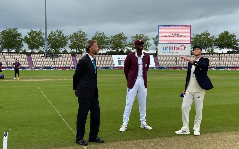 Ben Stokes (right) and West Indies captain Jason Holder perform the coin toss ahead of the start of play on day one of the Test Series  - PA