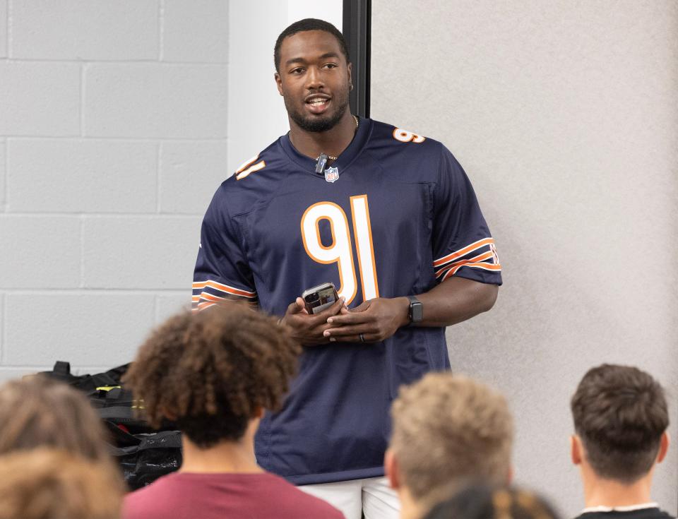 Chicago Bears defensive end Dominique Robinson, a Canton McKinley High School graduate, speaks to the Bulldogs football team, Wednesday, July 12, 2023.