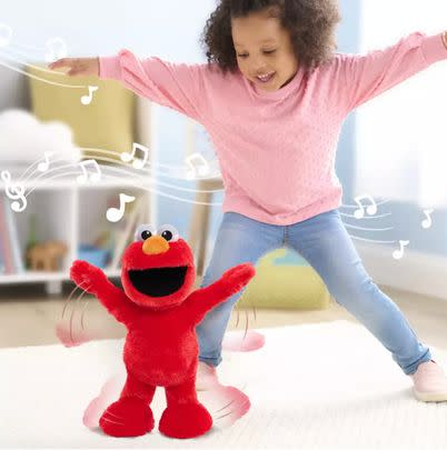Dance and slide along with Elmo.