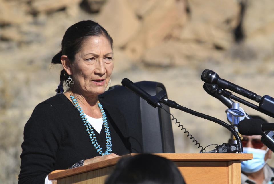 FILE - United States Interior Secretary Deb Haaland addresses a crowd during a celebration at Chaco Culture National Historical Park in northwestern New Mexico, Nov. 22, 2021. The U.S. Interior Department's plan to withdraw hundreds of square miles in New Mexico from oil and gas production for the next 20 years is expected to result in only a few dozen wells not being drilled on federal land surrounding Chaco Culture National Historical Park, according to an environmental assessment. (AP Photo/Susan Montoya Bryan, File)