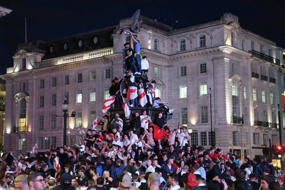 Fans of England celebrate after winning the UEFA EURO 2020 quarterfinal football match between Ukraine with 4-0, on July 3, 2021 in London, United Kingdom.