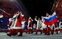 Russia's team members march during the opening ceremony of the 2014 Sochi Winter Olympic Games February 7, 2014. REUTERS/Brian Snyder