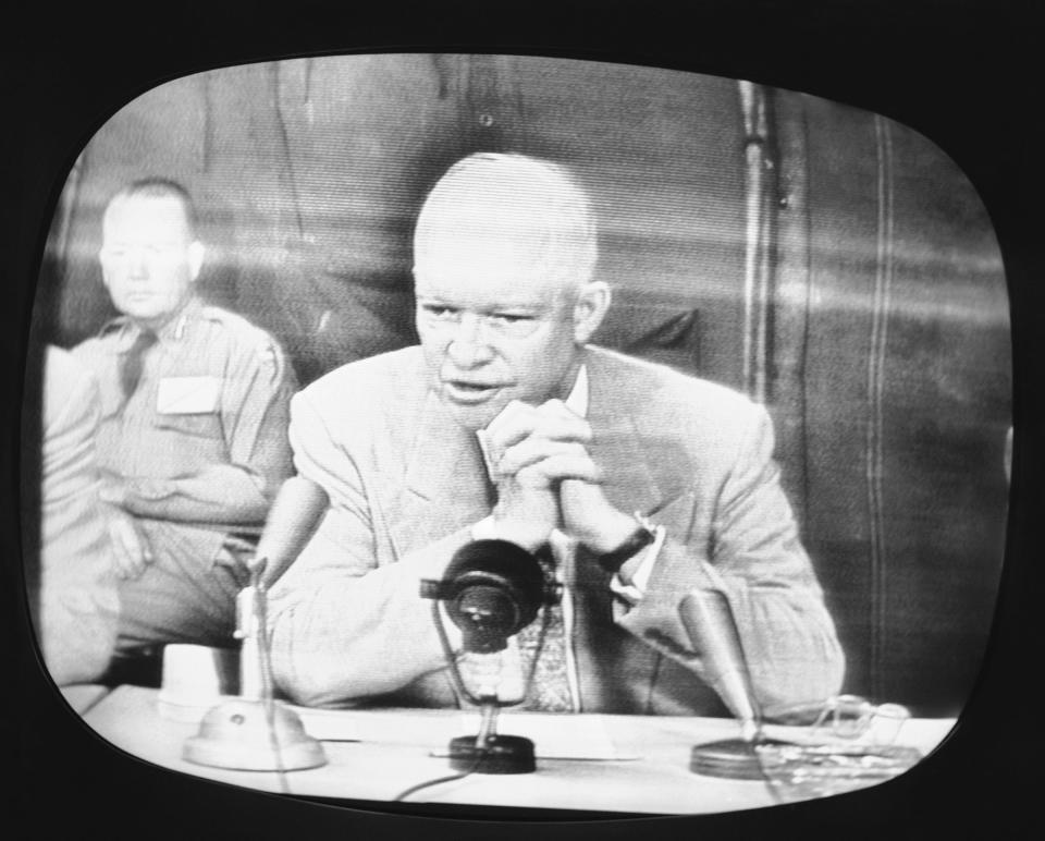 FILE - In this June 15, 1955, file photo, President Dwight D. Eisenhower, shown on an NBC Television monitor television receiver in New York reports to the nation on progress of the nationwide 'Operation Alert,' when the nation went underground during the simulated H-Bomb attack on June 15. (AP Photo, File)