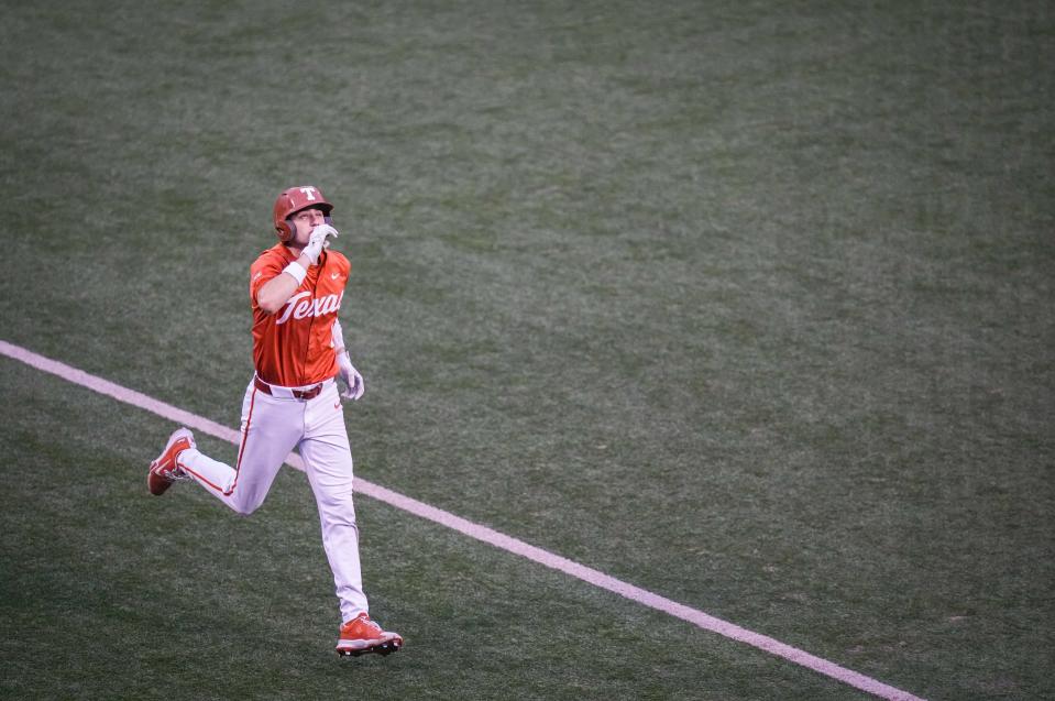 Texas' Jalin Flores celebrates as he heads toward the plate after hitting a home run against UT-Arlington on April 23. The Longhorns have hit 95 homers this season, seventh-most in the country, and are hoping to challenge the 2022 team's school record of 128.