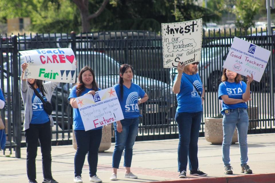 Members of the Stockton Teachers Association held a protest outside of the Stockton Unified School District headquarters on Tuesday, April 23, 2024.