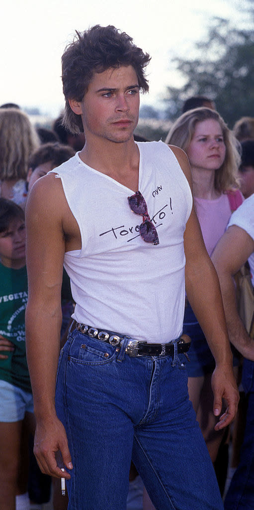 closeup of a young Rob in a tight tank top