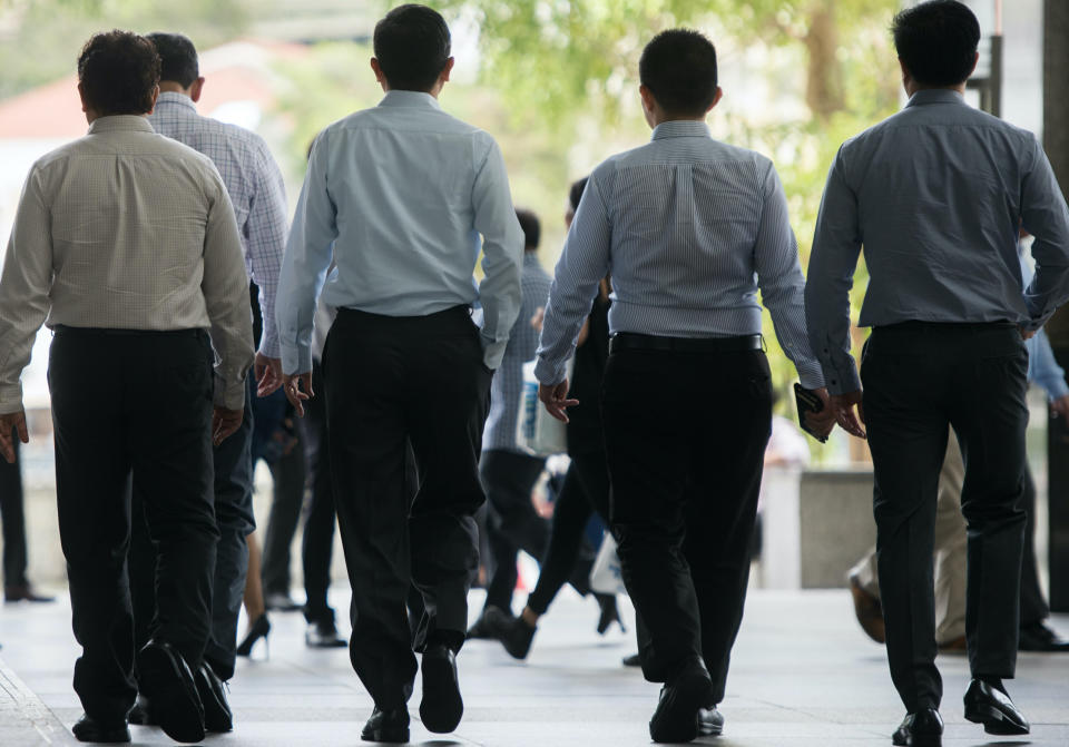 Lunch Crowd in Raffles Place. (FILE PHOTO: Yahoo News Singapore)