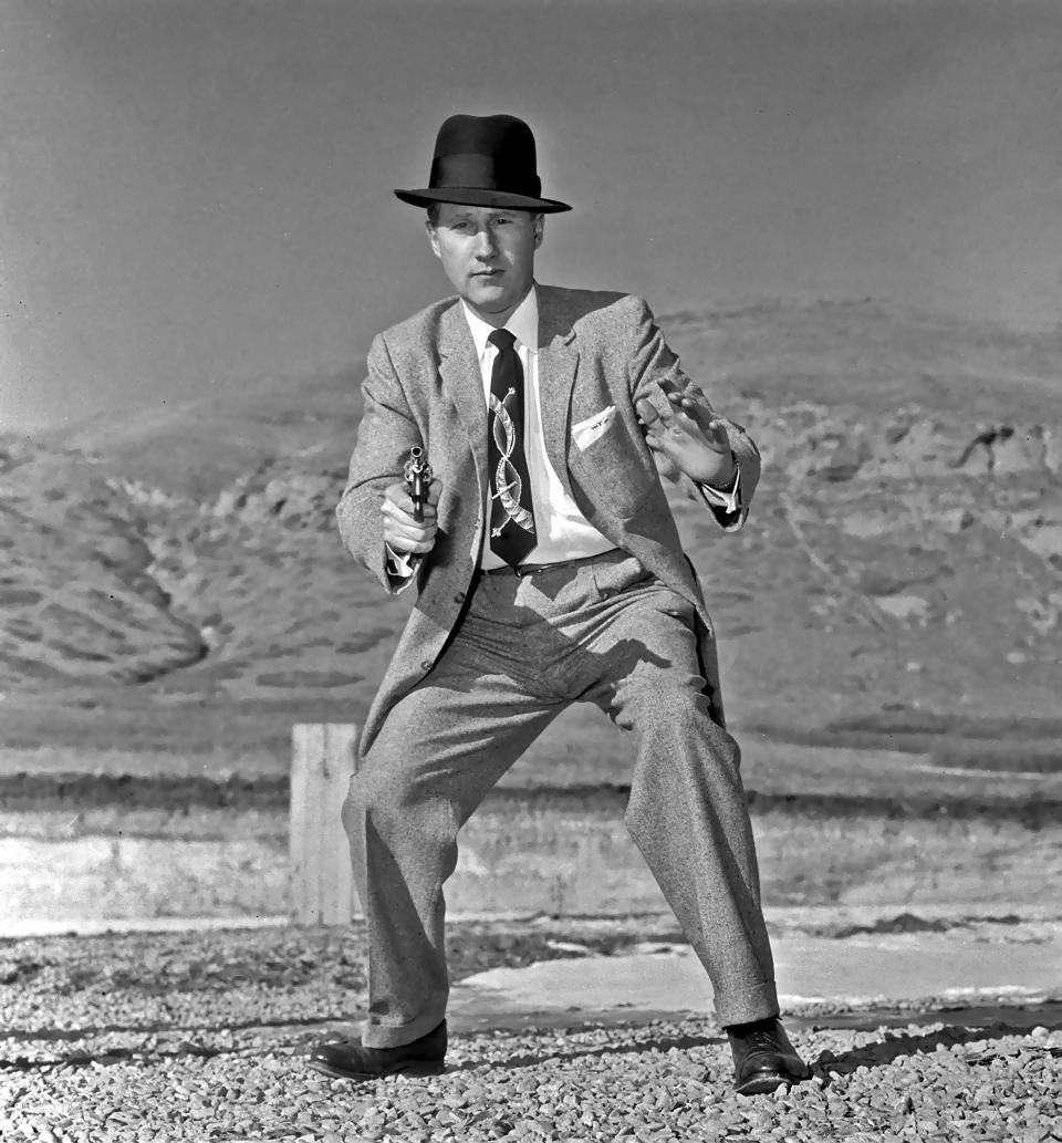 SALT LAKE CITY - JANUARY 20: (FILE PHOTO) (News Mags Out Until June 14, 2005) Mark Felt posing for a picture with his pistol drawn for a newspaper story in this photo taken January 20, 1958 in Salt Lake City, Utah. An article written in Vanity Fair magazine in June 2005 claims that Felt was 'Deep Throat', the long-anonymous source who leaked secrets about President Nixon's Watergate cover-up to The Washington Post in the early 1970's.  (Photo by Howard Moore/Deseret Morning News/Getty Images)