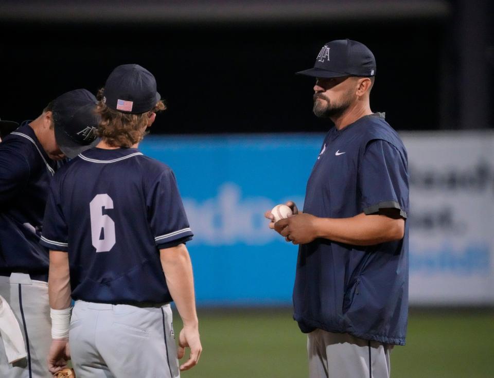 May 16, 2022; Tempe, Arizona, USA; ALA Gilbert North head coach Brett Brewer makes a pitching change against Northwest Christian during the 3A baseball final at Tempe Diablo Stadium. Mandatory Credit: Michael Chow-Arizona Republic