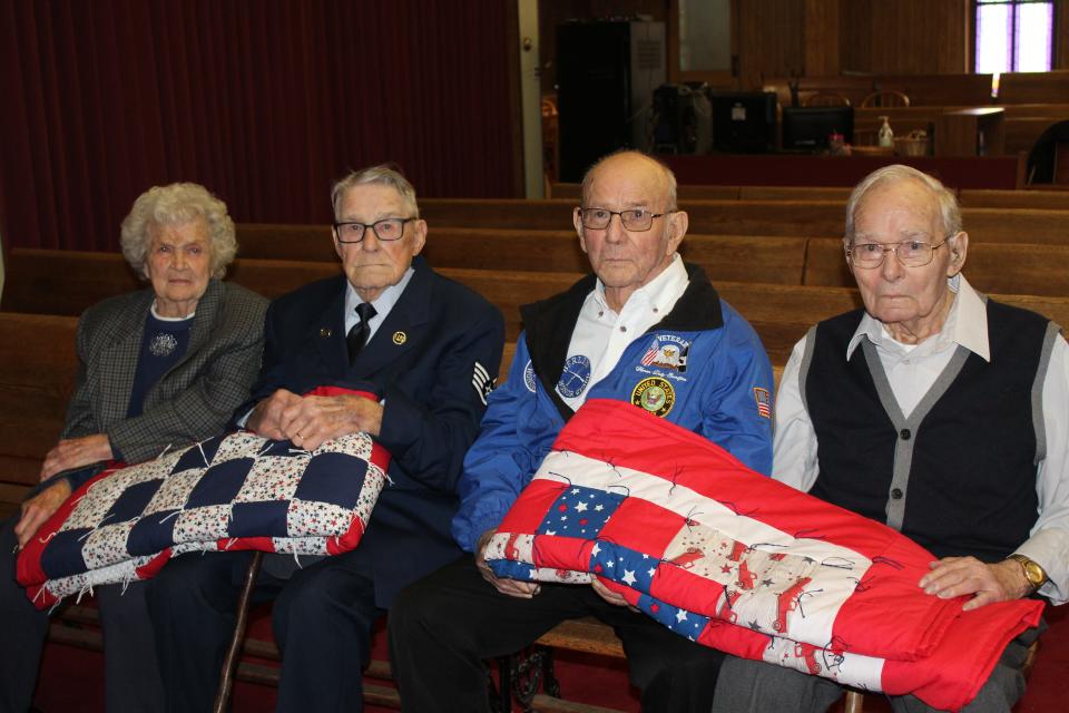 Four Berlin area veterans attending the Holy Trinity Lutheran Church ceremony on Nov. 13 were over the age of 90. They are (from left): Marian Miller Dyer, 96, World War II; Dale Leslie, 94, Korea; Charles Maust, 91, Korea; and Ed Zorn, 95, World War II.