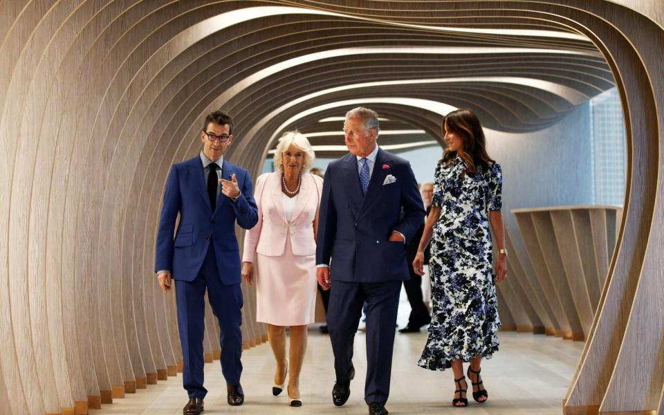 The Prince of Wales and the Duchess of Cornwall toured the new tech hub created by the Yoox Net-a-Porter Group with Loehnis in 2018 - Henry Nicholls/PA