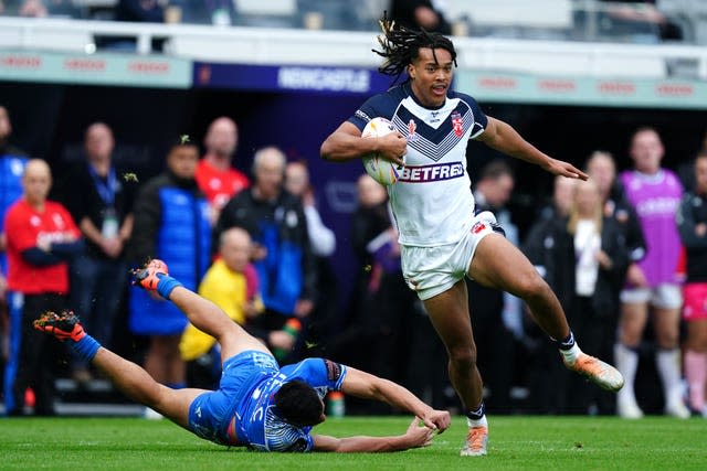 Dom Young breaks clear to score his first try