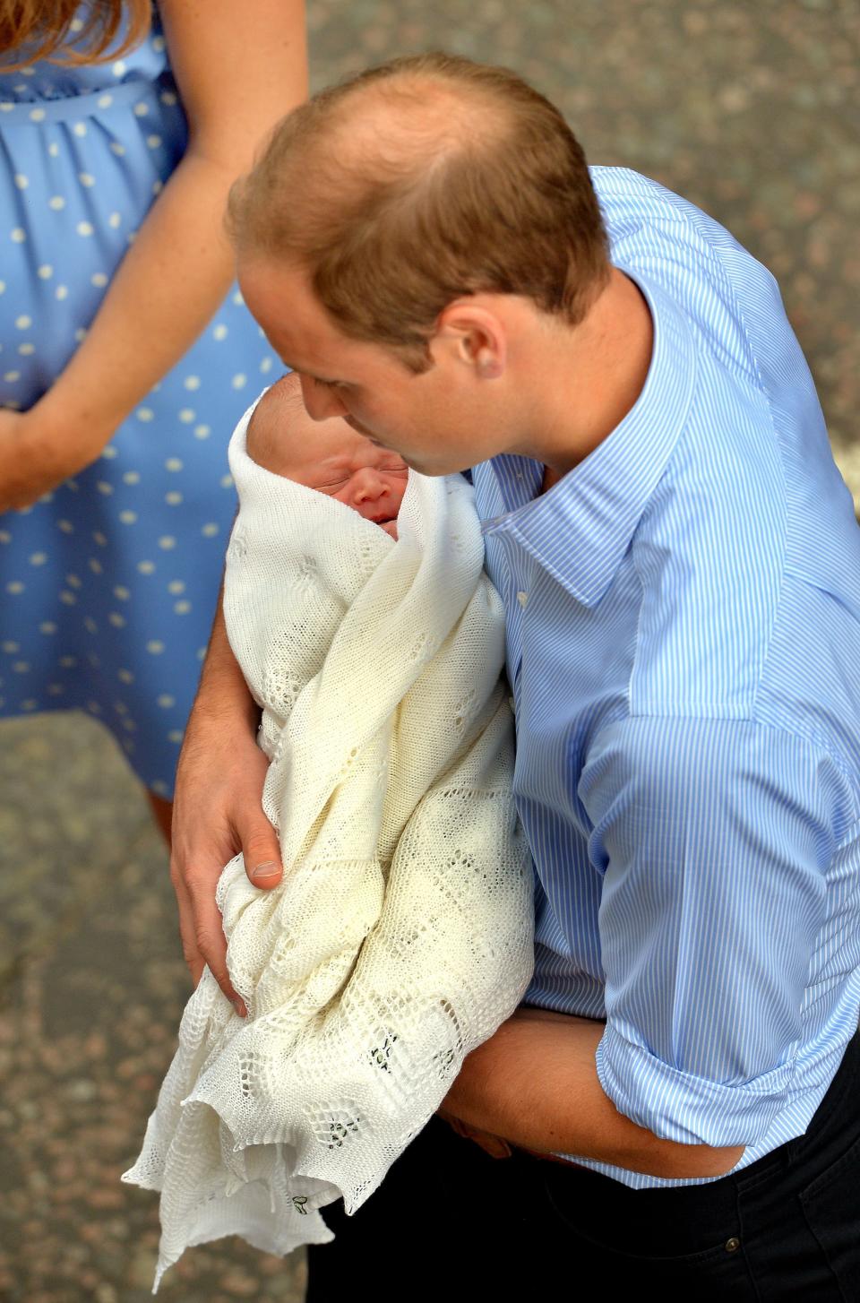 The safe hands of the Duke of Cambridge, as the royal couple and their son who was born yesterday, leave the Lindo Wing of St Mary's Hospital in west London.