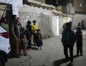 <p>People gather at street after a 7.2 magnitude earthquake hit northern Iraq in Sulaymaniyah, Iraq on Nov. 12, 2017. (Photo: Feriq Ferec/Anadolu Agency/Getty Images) </p>