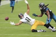 Pittsburgh Steelers wide receiver Chase Claypool (11) tries but can't make a reception in front of Jacksonville Jaguars cornerback Chris Claybrooks during the first half of an NFL football game, Sunday, Nov. 22, 2020, in Jacksonville, Fla. (AP Photo/Matt Stamey)