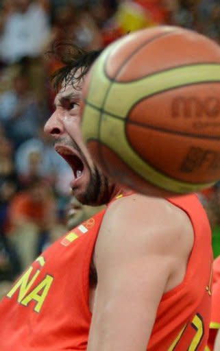 Spanish guard Sergio Llull reacts as he dunks against France during their London 2012 Olympic Games men's quarterfinal basketball match in London. Nursing bruises and a grudge, reigning European champion Spain will face Russia in an Olympic men's basketball semi-final after outlasting France 66-59 in a punishing physical matchup on Wednesday