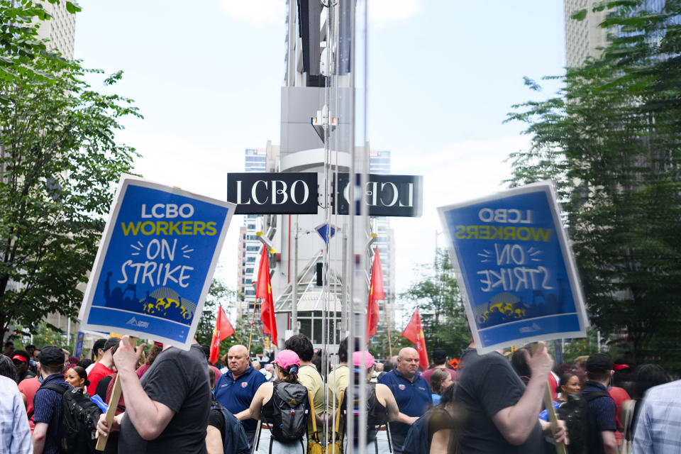 LCBO workers and supporters hold a strike rally at a picket line outside an LCBO store in Toronto on Saturday, July 6, 2024. THE CANADIAN PRESS/Christopher Katsarov