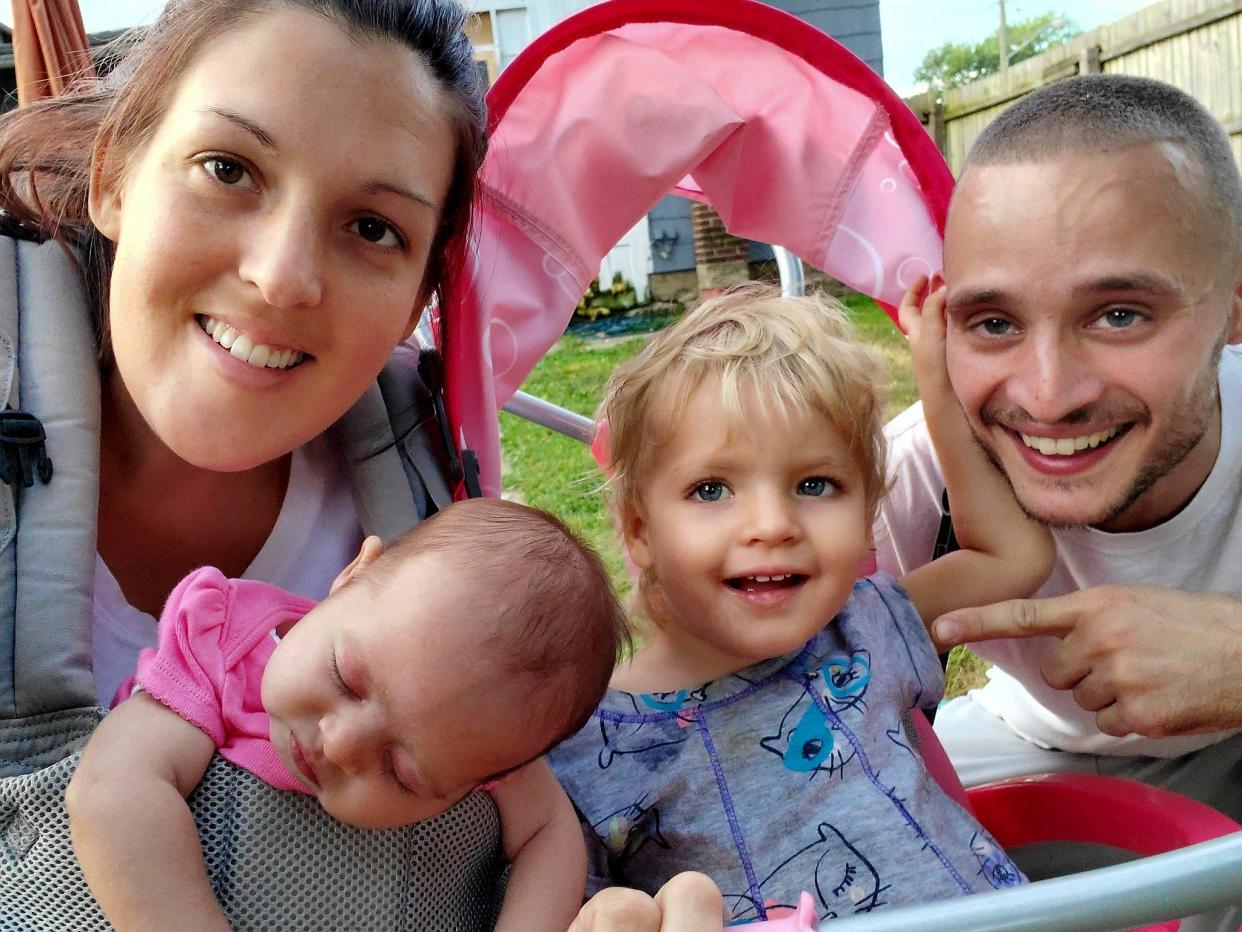 Everly Martin at 21 months old, second from right, with her family, from left: Mother, Crystal Grooms; sister, Lena Martin, and father, Rob Martin