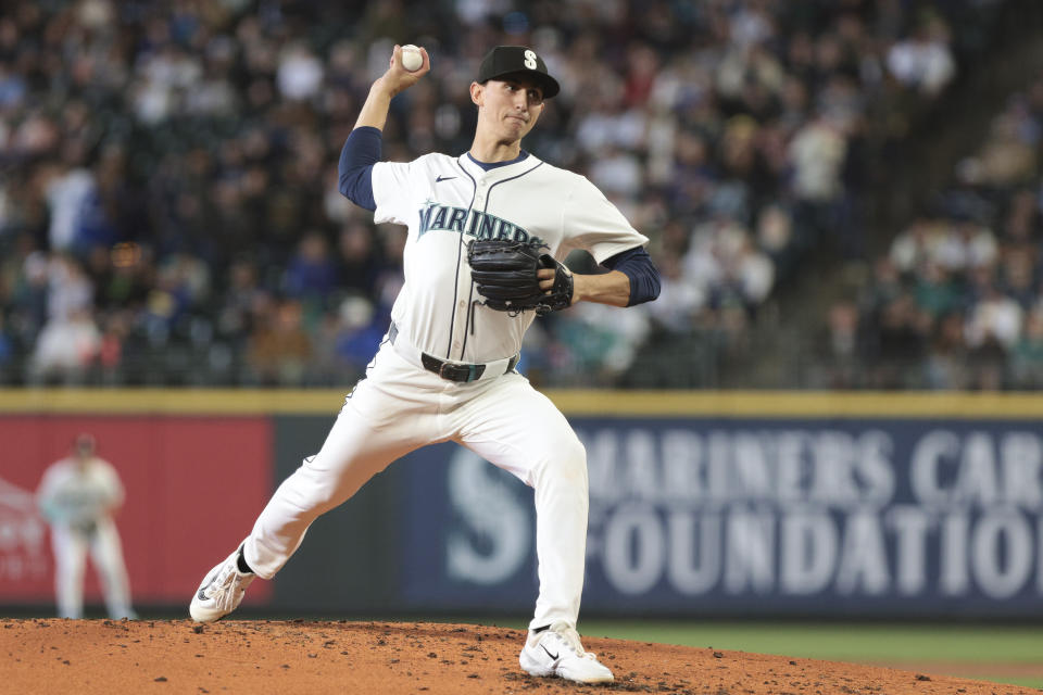 Seattle Mariners starting pitcher George Kirby throws to a Texas Rangers batter during the second inning of a baseball game Saturday, June 15, 2024, in Seattle. (AP Photo/Jason Redmond)