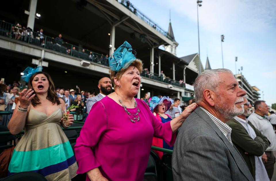 Marsha Dock cheers on her horse as daughter Emily Sheti reacts during to the opening night of the Spring Meet on Saturday, April 29, 2023, as Derby week starts at Churchill Downs in Louisville, Ky. It was Marsha and husband Don -- at far right -- first time at track since 1971, when they saw the Derby from the infield.