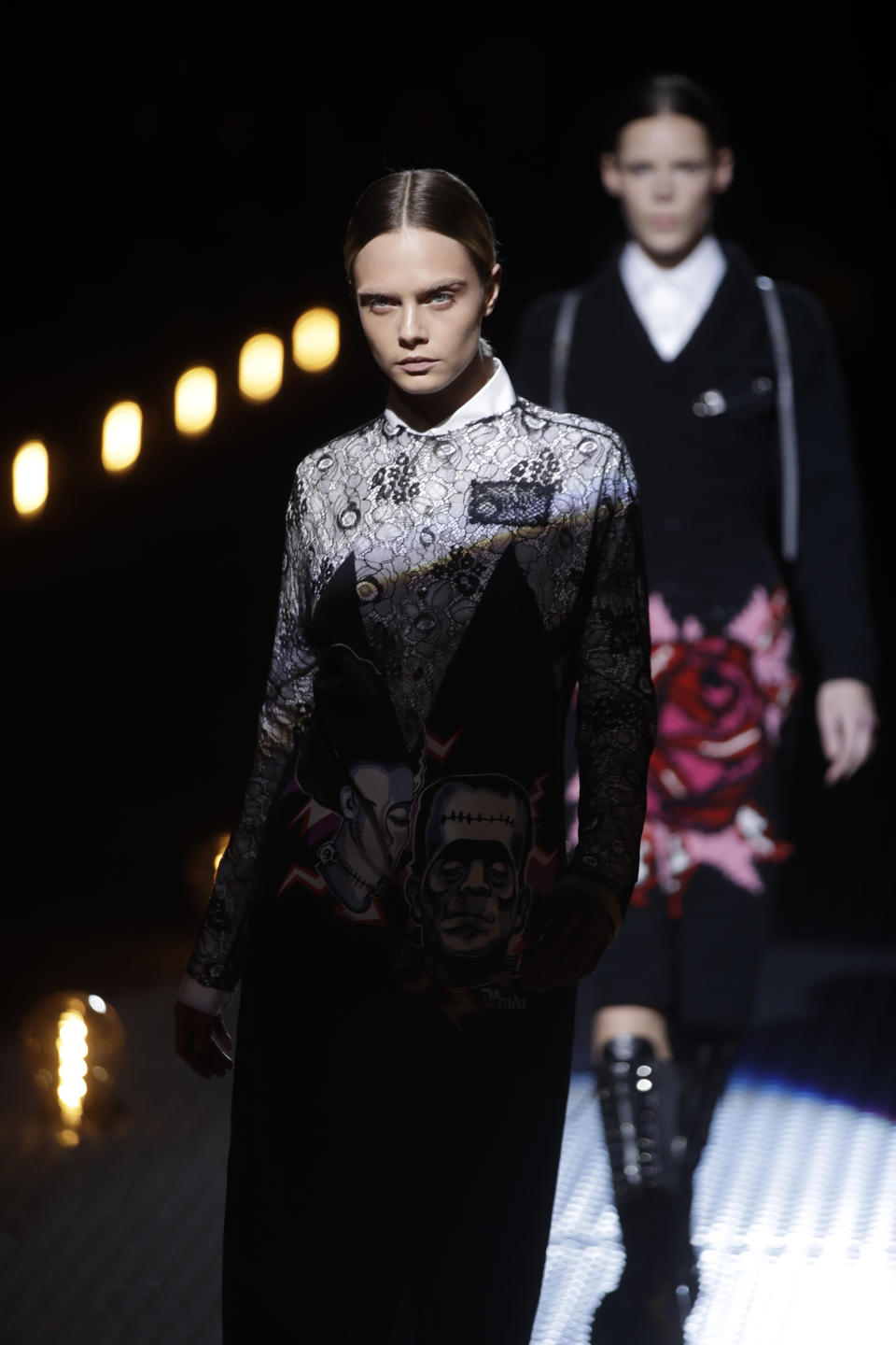 Model Cara Delevingne wears a creation as part of the Prada women's Fall-Winter 2019-2020 collection, that was presented in Milan, Italy, Thursday, Feb.21, 2019. (AP Photo/Luca Bruno)