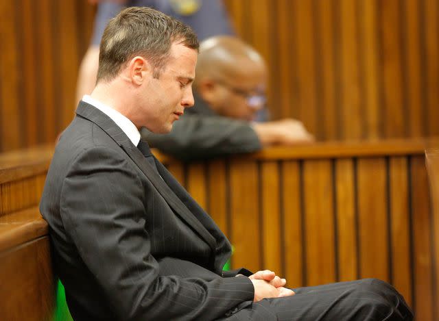 <p>Kim Ludbrook, Pool/AP</p> Oscar Pistorius reacts as Judge Thokozile Masipa delivers her verdict in murder trial on Sept. 11, 2014 in Pretoria, South Africa.