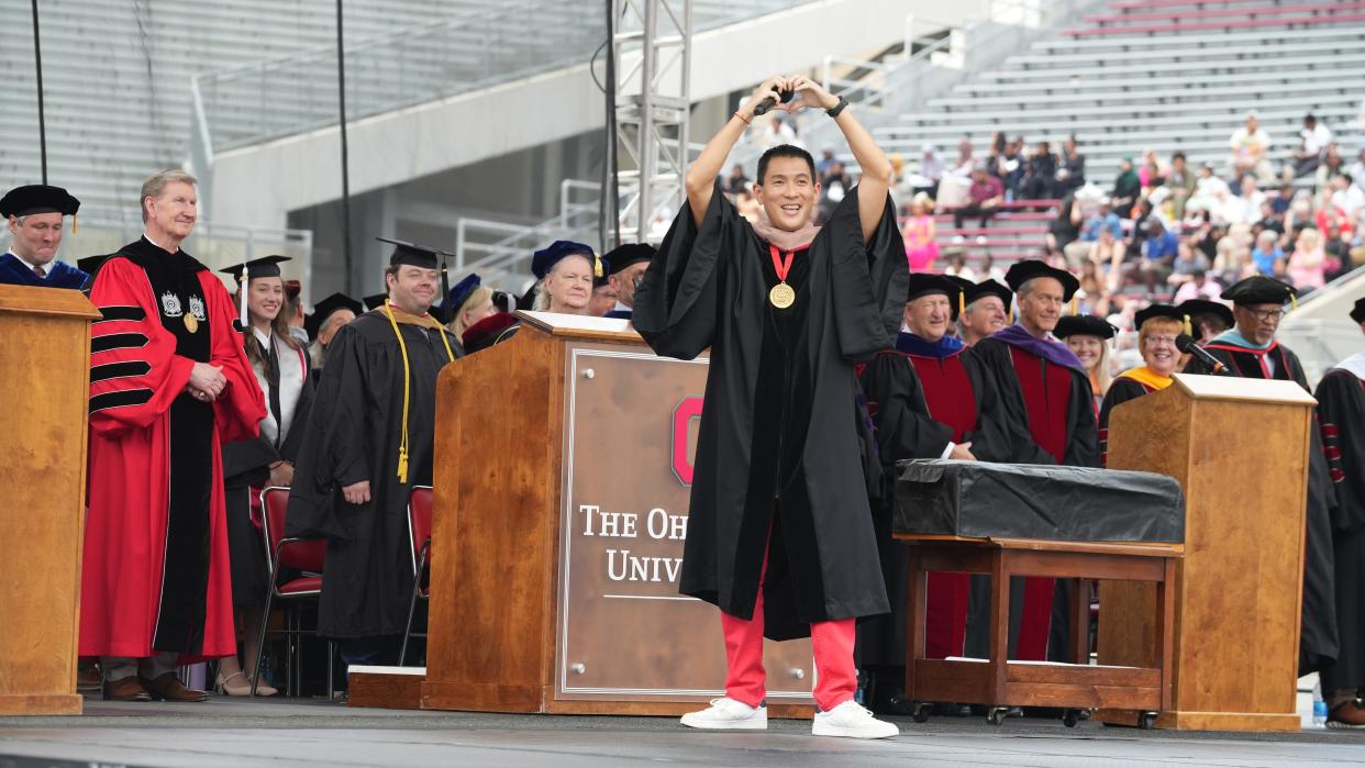 May 5, 2024; Columbus, Ohio, USA; Commencement address speaker Chris Pan, founder of MyIntent, interacts with the crowd during the Ohio State Spring 2024 Commencement held Sunday, May 5, 2024 in Ohio Stadium.