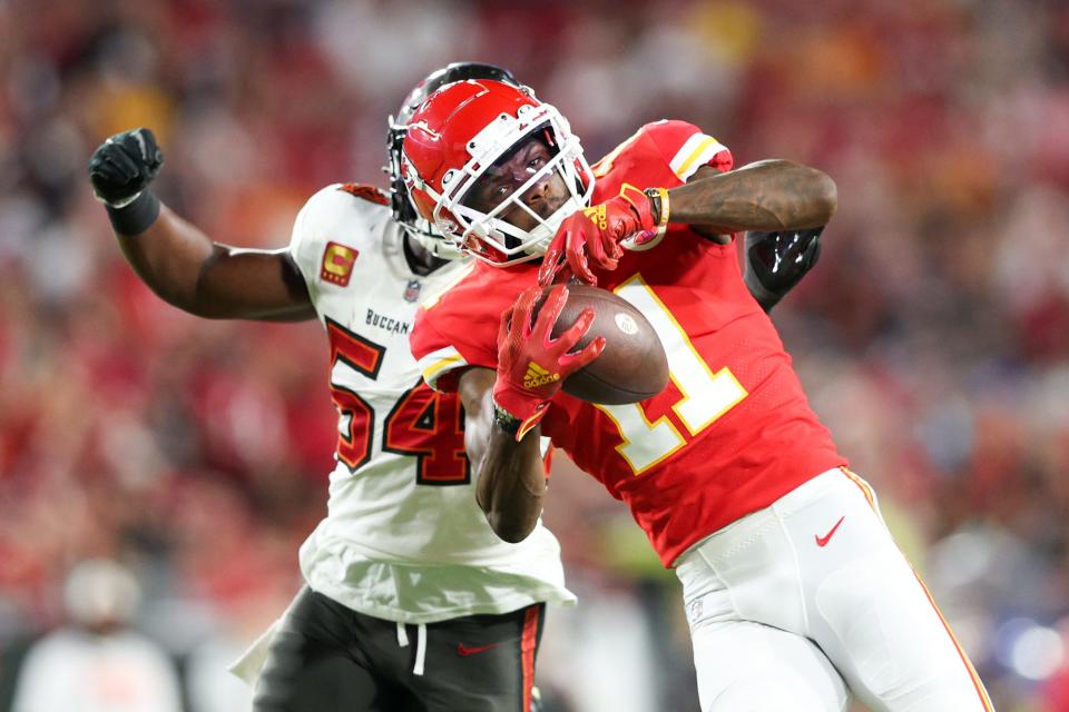 Kansas City Chiefs wide receiver Marquez Valdes-Scantling (11) catches a pass while defended by Tampa Bay Buccaneers linebacker Lavonte David.