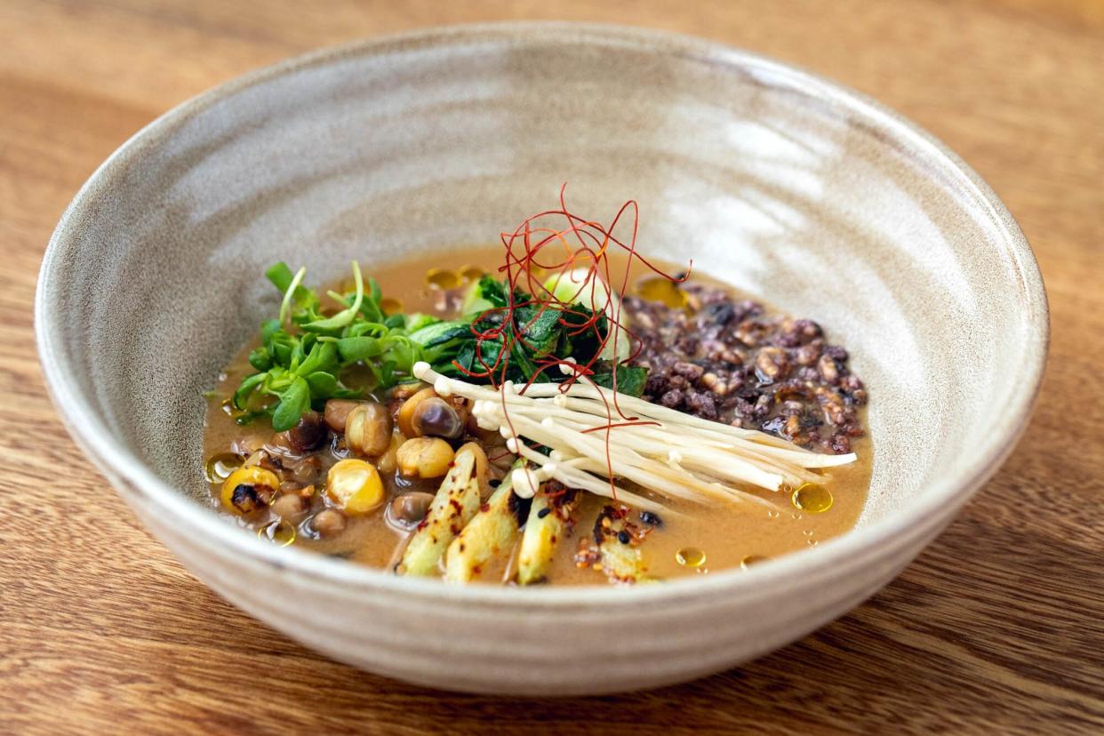 Sooki &amp; Mimi pozole with doenjang, potawatomi flint corn, puffed rice, chayote, enoki