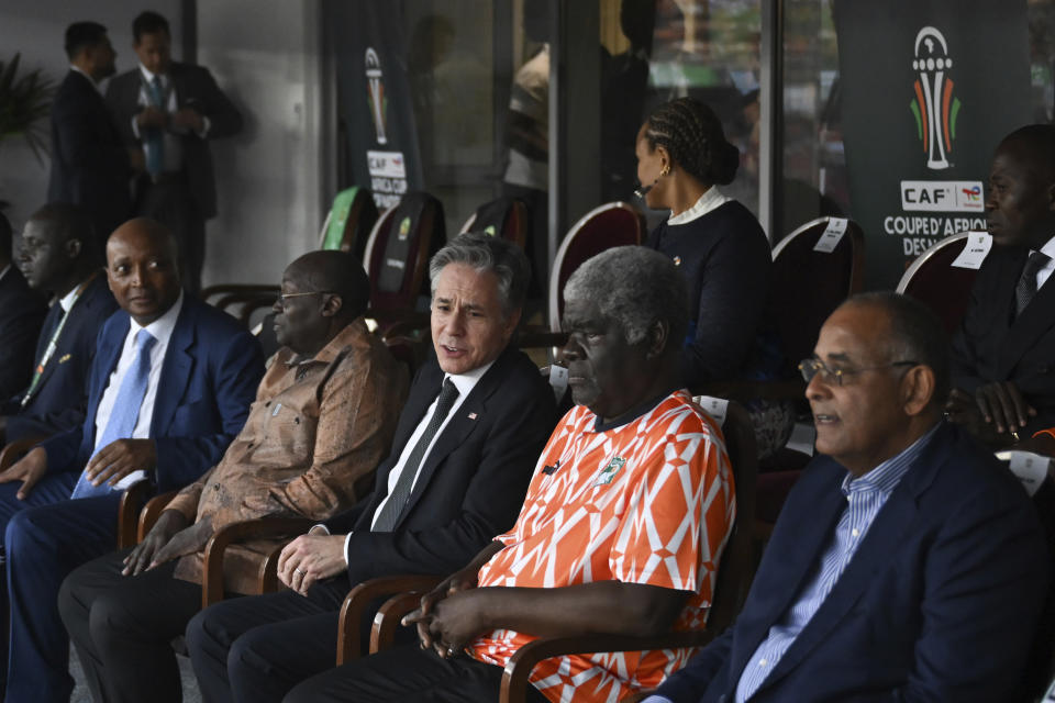 US Secretary of State Antony Blinken, center, Prime Minister of Ivory Coast Robert Beugre Mambe, 2nd right, and President of the Confederation of African Football (CAF) Patrice Motsepe, 2nd left, watch the Africa Cup of Nations (CAN) 2024 group A soccer match between Equatorial Guinea and Ivory Coast at the Alassane Ouattara Stadium in Ebimpe, Abidjan Abidjan, Ivory Coast, Monday, Jan. 22, 2024. (Andrew Caballero-Reynolds/Pool Photo via AP)