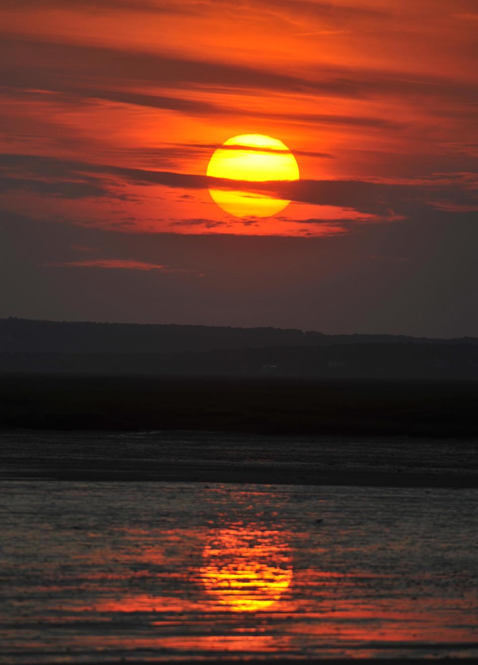 Sunset arrives earlier and the sun drifts father south on the horizon every day as Cape Cod heads into autumn.