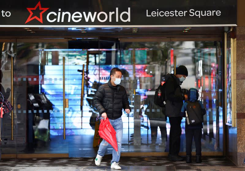 FILE PHOTO: People are seen at a Cineworld in Leicester’s Square in London