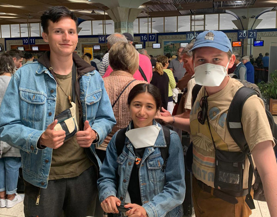 Image: From left, Alex Walsh, Genevieve Serna and Jacob Muscarella at Agadir airport in Morocco on Wednesday hoping to board a flight back to the U.S. (Genevieve Serna)