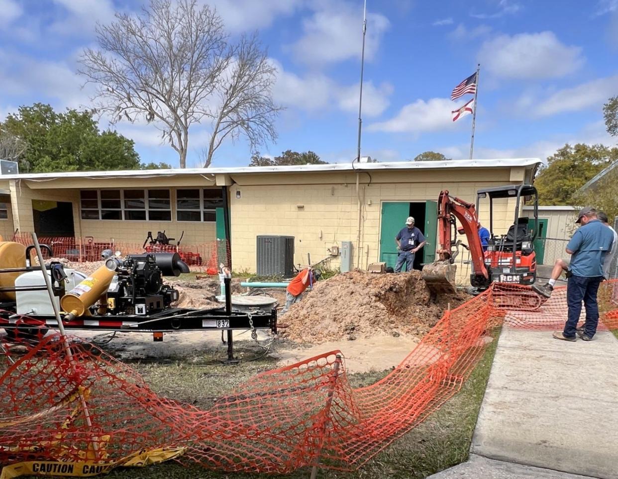 Construction crew at work during school hours earlier this month at Rimes Learning Center