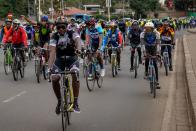 Members of the Nairobi chapter of Critical Mass cycle as they commemorate a friend who was killed while cycling in Nairobi