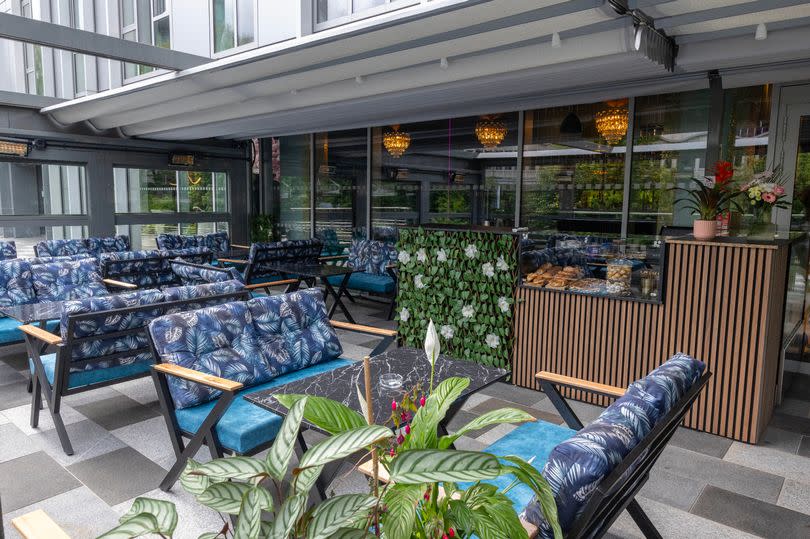 The terrace area features a retractable roof and a dessert bar for those sunnier gatherings
