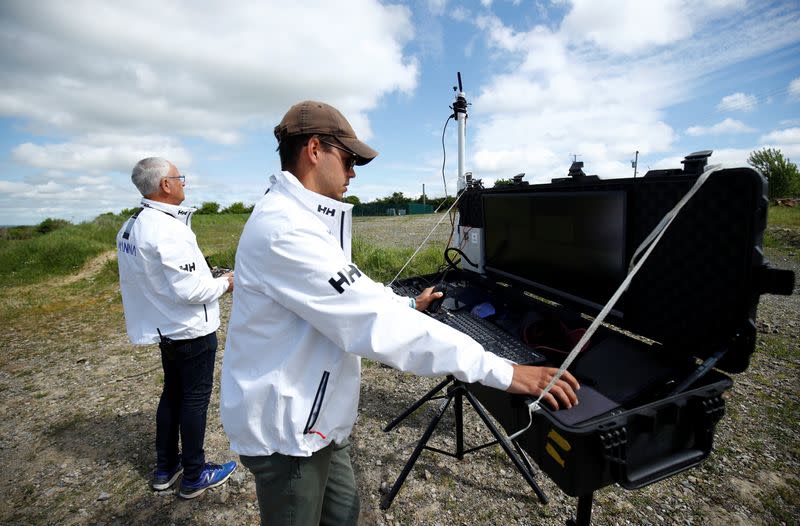 Drone operators from Manna Aero fly the drone as essential household and medical supplies are delivered to the Irish village of Moneygall