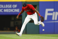 Cleveland Guardians right fielder Oscar Gonzalez commits a fielding error that allowed Detroit Tigers designated hitter Javier Baez to reach first during the seventh inning in the second baseball game of a doubleheader Monday, Aug. 15, 2022, in Cleveland. (AP Photo/Ron Schwane)