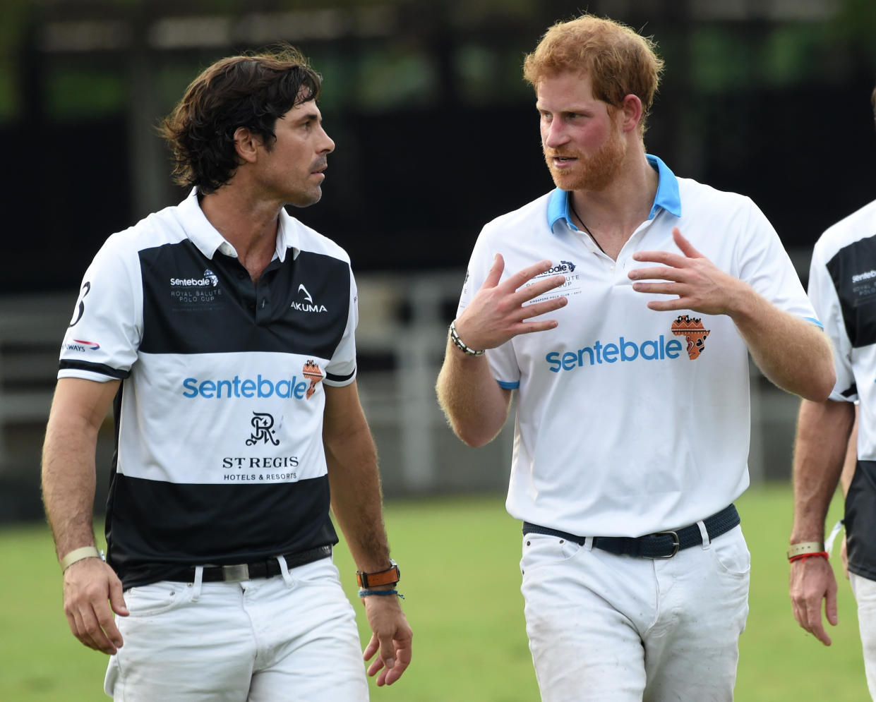 Britain's Prince Harry (R) walks with Argentinian polo player Nacho Figueras (L) after taking part in the Sentebale Royal Salute Polo Cup in Singapore on June 5, 2017.
Prince Harry is on a two-day visit to Singapore to take part in charity events. / AFP PHOTO / ROSLAN RAHMAN        (Photo credit should read ROSLAN RAHMAN/AFP via Getty Images)